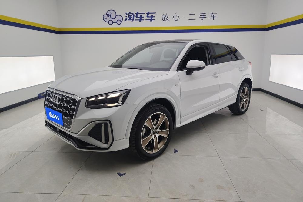 Audi Q2L 2024 — фото автомобиля 1