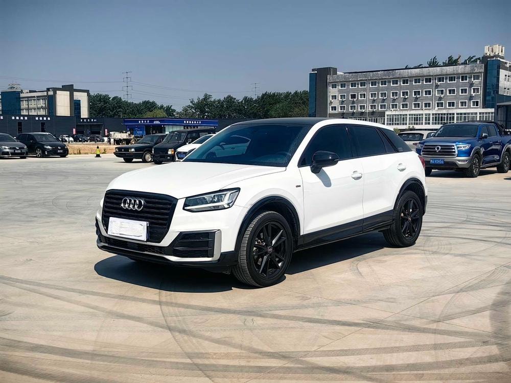 Audi Q2L 2018 — фото автомобиля 1