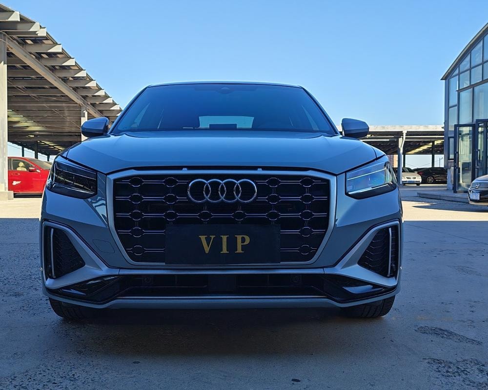 Audi Q2L 2022 — фото автомобиля 1