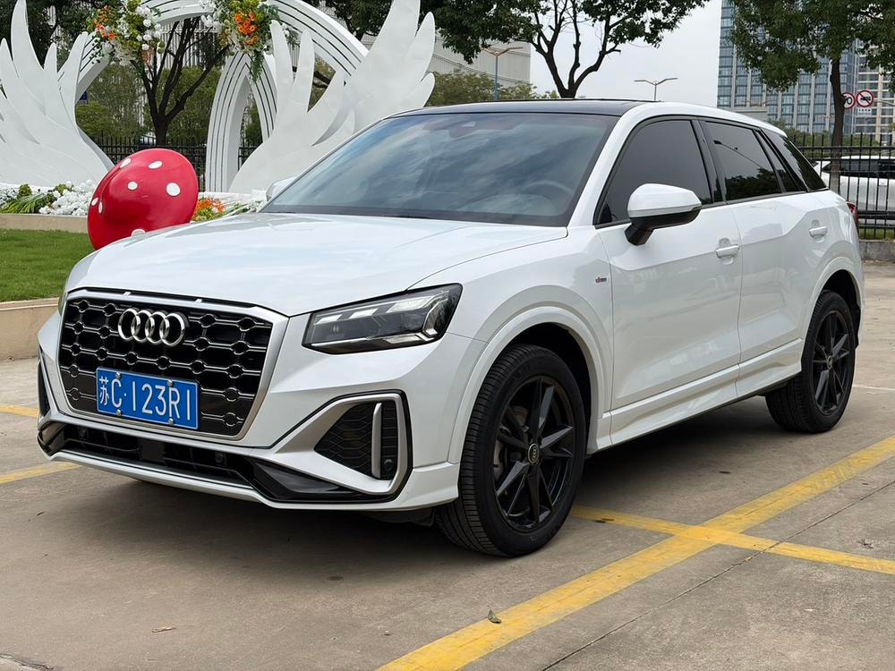 Audi Q2L 2022 — фото автомобиля 1