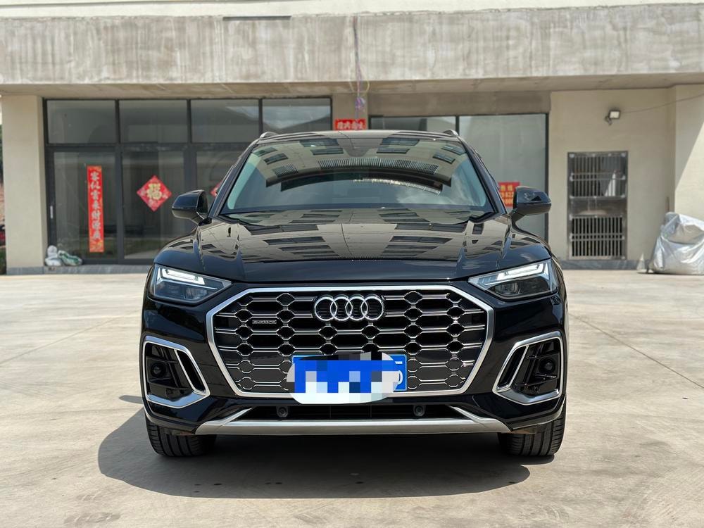Audi Q5L 2024 — фото автомобиля 1