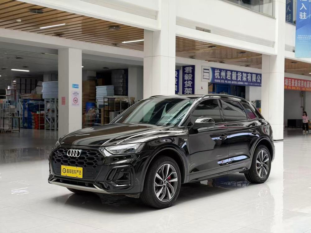 Audi Q5L 2024 — фото автомобиля 1