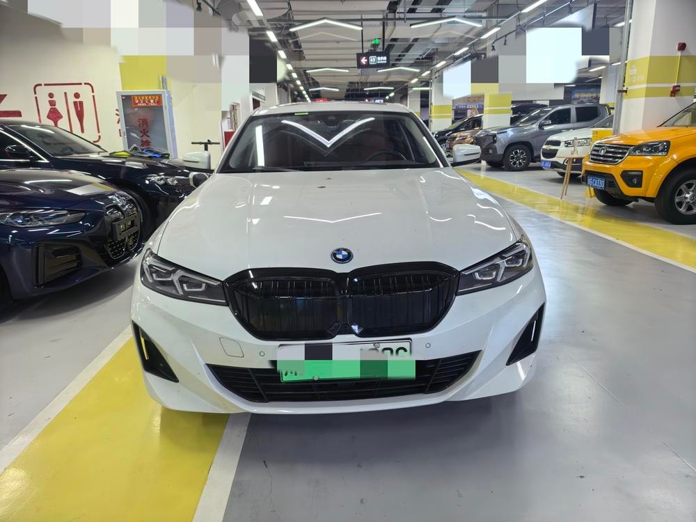 BMW i3 2023 — фото автомобиля 1