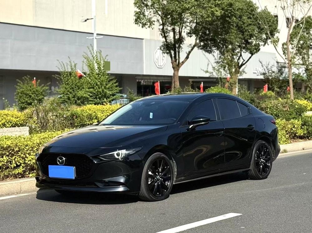 Mazda 3 Axela 2023 — фото автомобиля 1