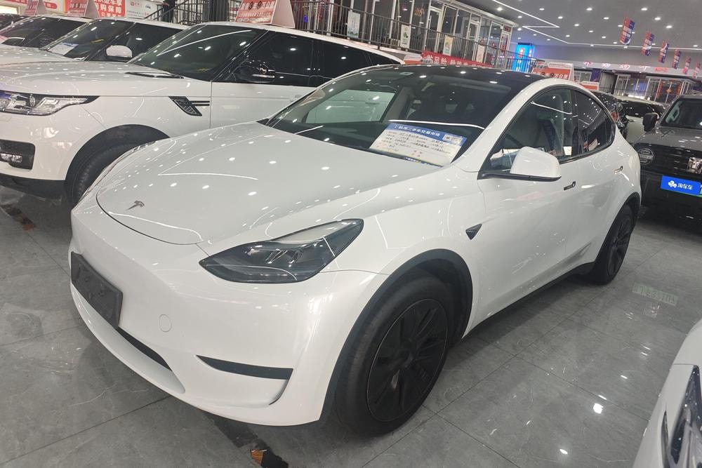 Tesla Model Y 2024 — фото автомобиля 1