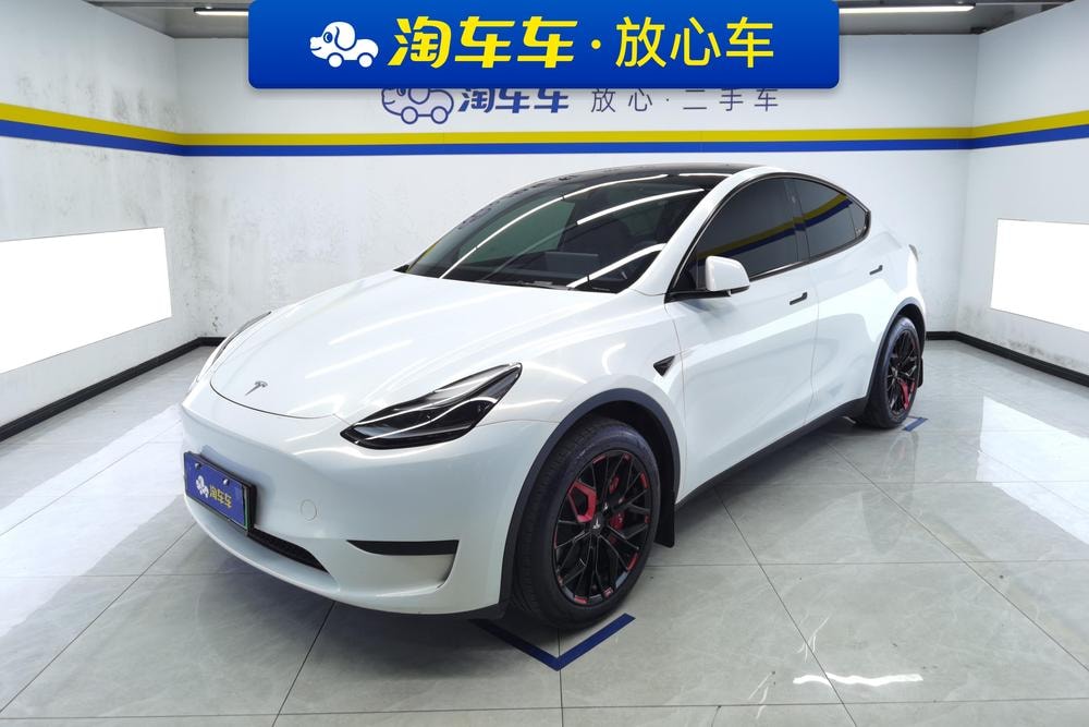 Tesla Model Y 2024 — фото автомобиля