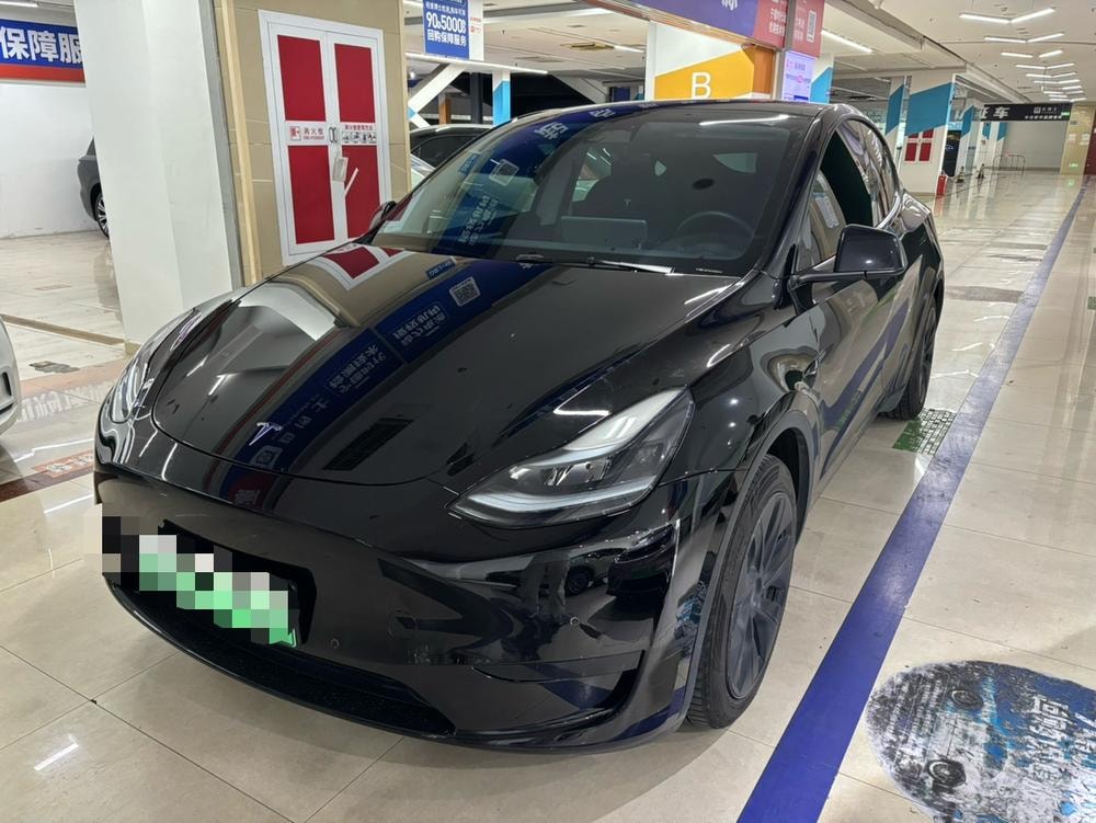 Tesla Model Y 2023 — фото автомобиля