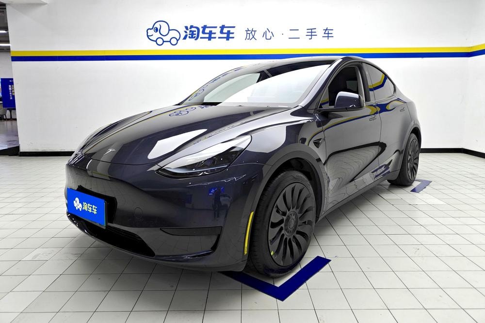 Tesla Model Y 2024 — фото автомобиля