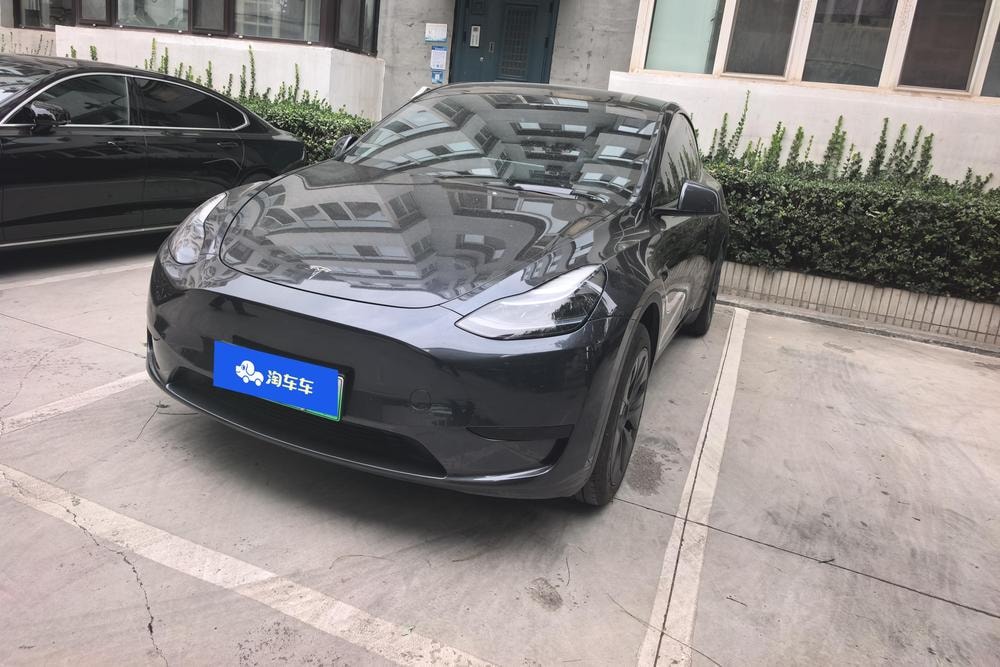 Tesla Model Y 2024 — фото автомобиля 1