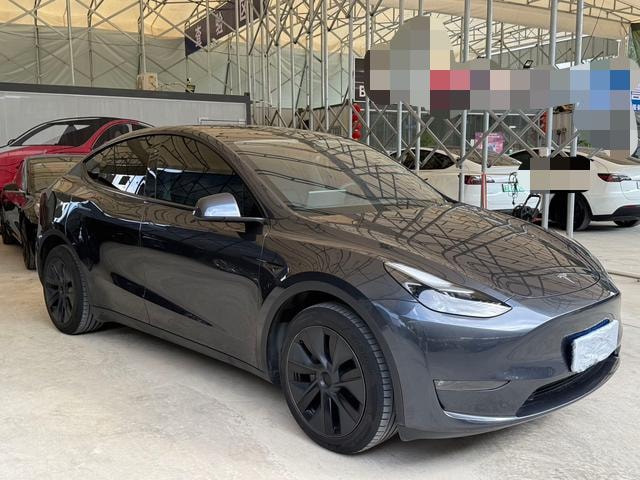 Tesla Model Y 2024 — фото автомобиля 1