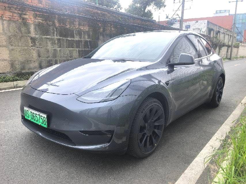 Tesla Model Y 2023 — фото автомобиля 1