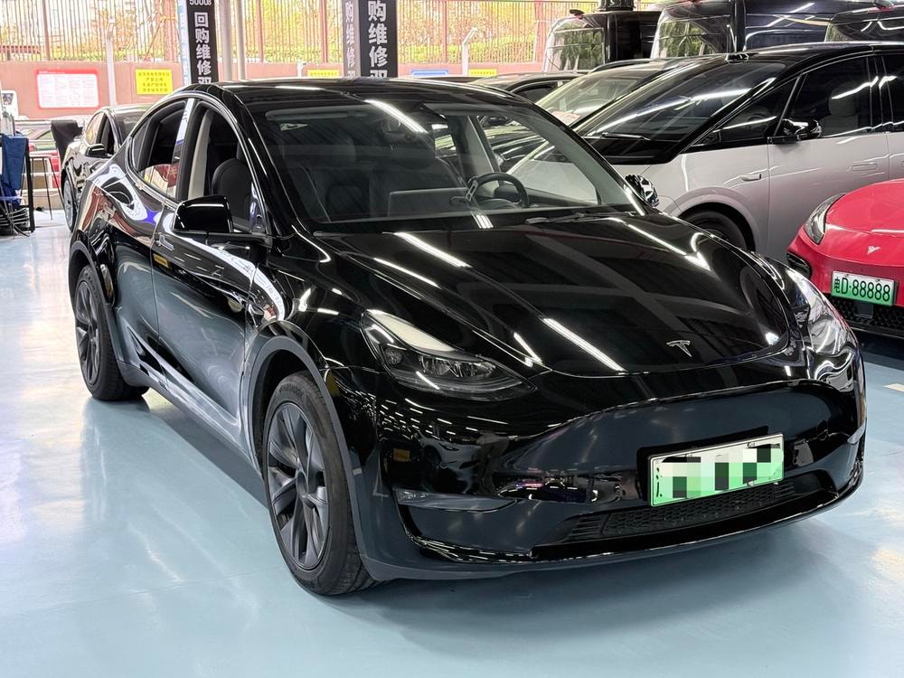 Tesla Model Y 2023 — фото автомобиля