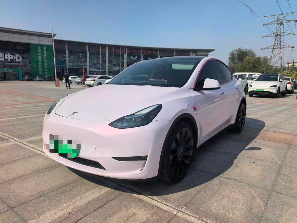 Tesla Model Y 2024 — фото автомобиля 1