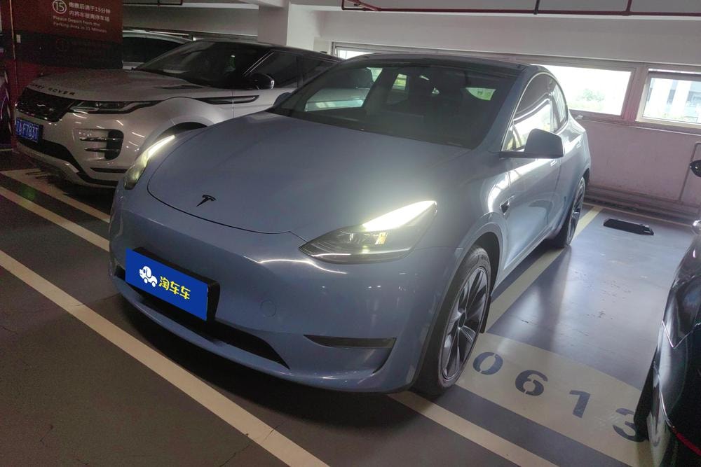 Tesla Model Y 2024 — фото автомобиля 1