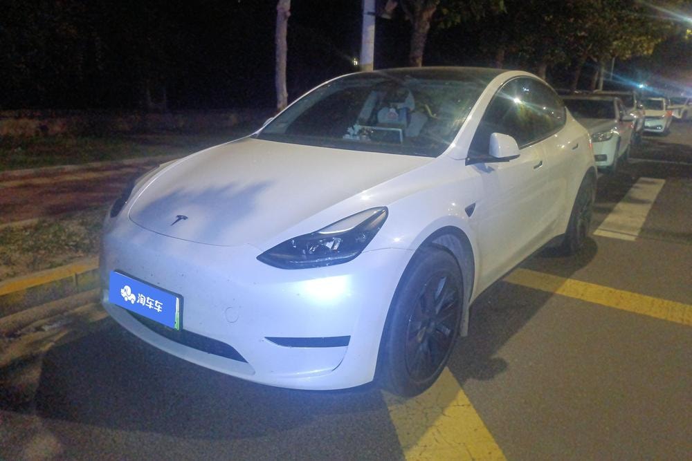 Tesla Model Y 2024 — фото автомобиля 1