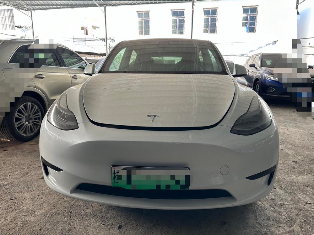 Tesla Model Y 2024 — фото автомобиля 1