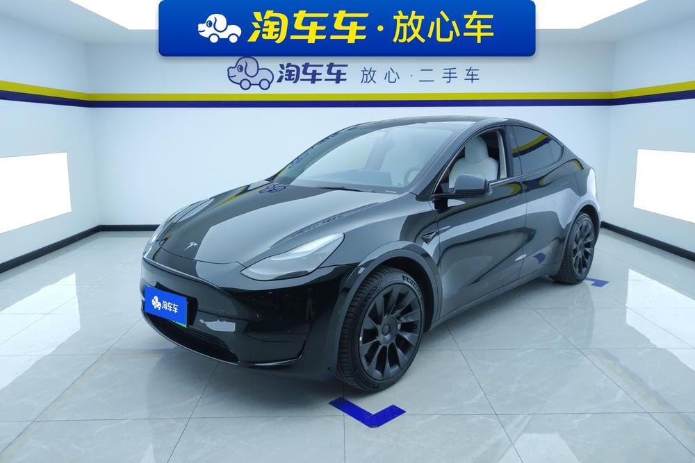 Tesla Model Y 2023 — фото автомобиля 1