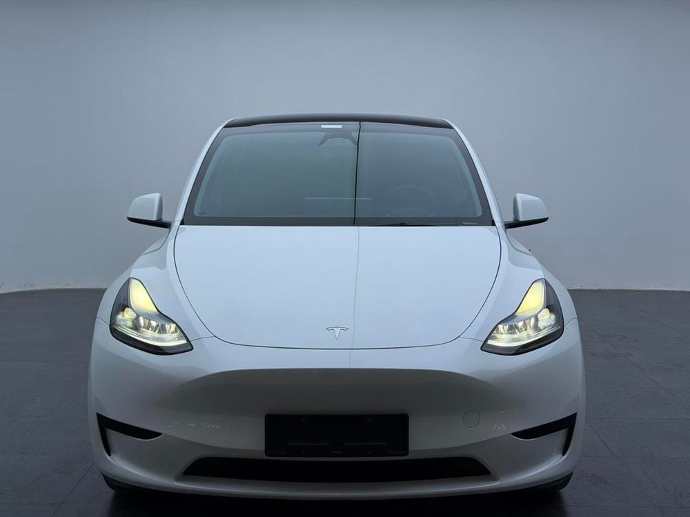 Tesla Model Y 2024 — фото автомобиля 1