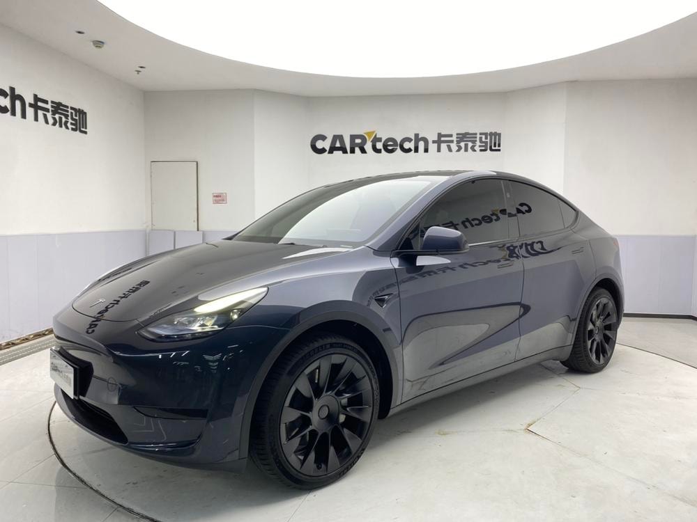 Tesla Model Y 2024 — фото автомобиля