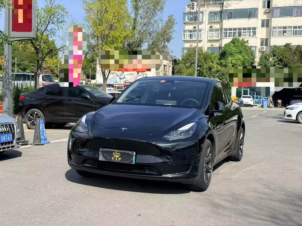 Tesla Model Y 2024 — фото автомобиля