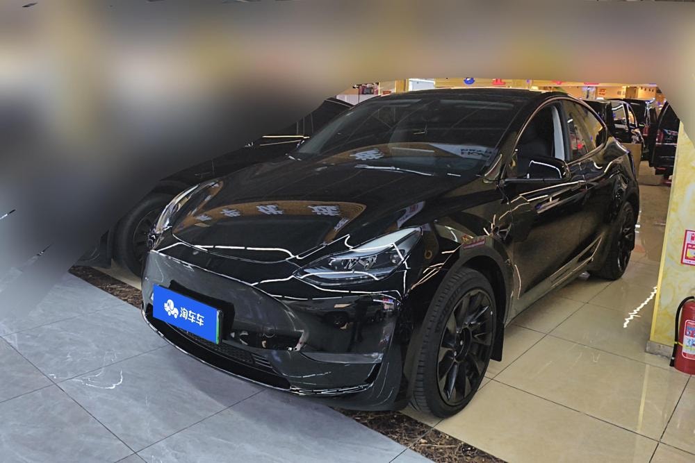 Tesla Model Y 2024 — фото автомобиля
