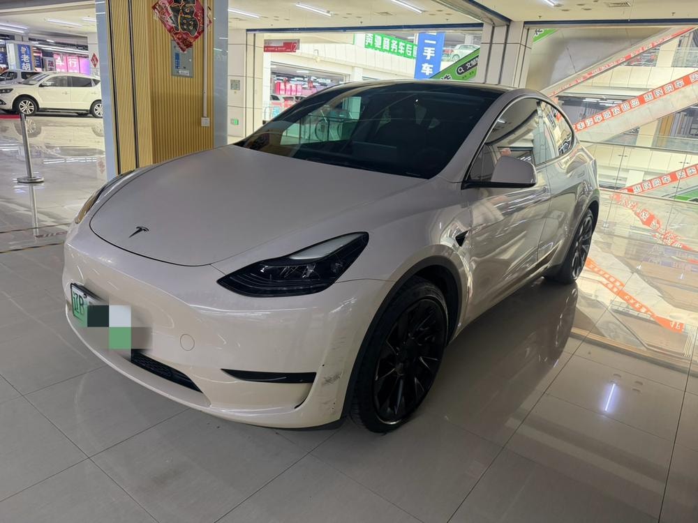 Tesla Model Y 2023 — фото автомобиля