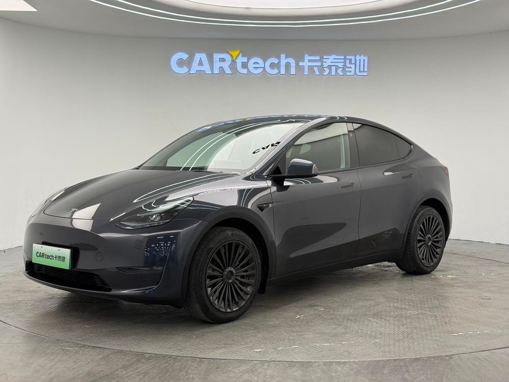 Tesla Model Y 2024 — фото автомобиля