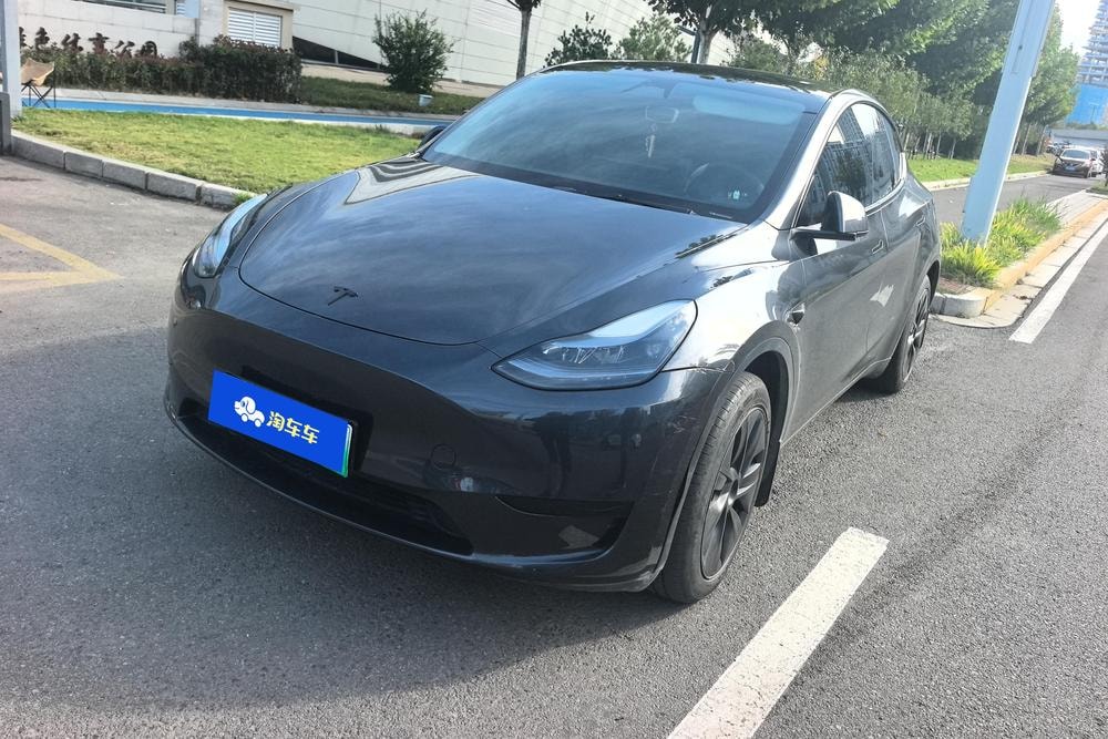 Tesla Model Y 2024 — фото автомобиля 1