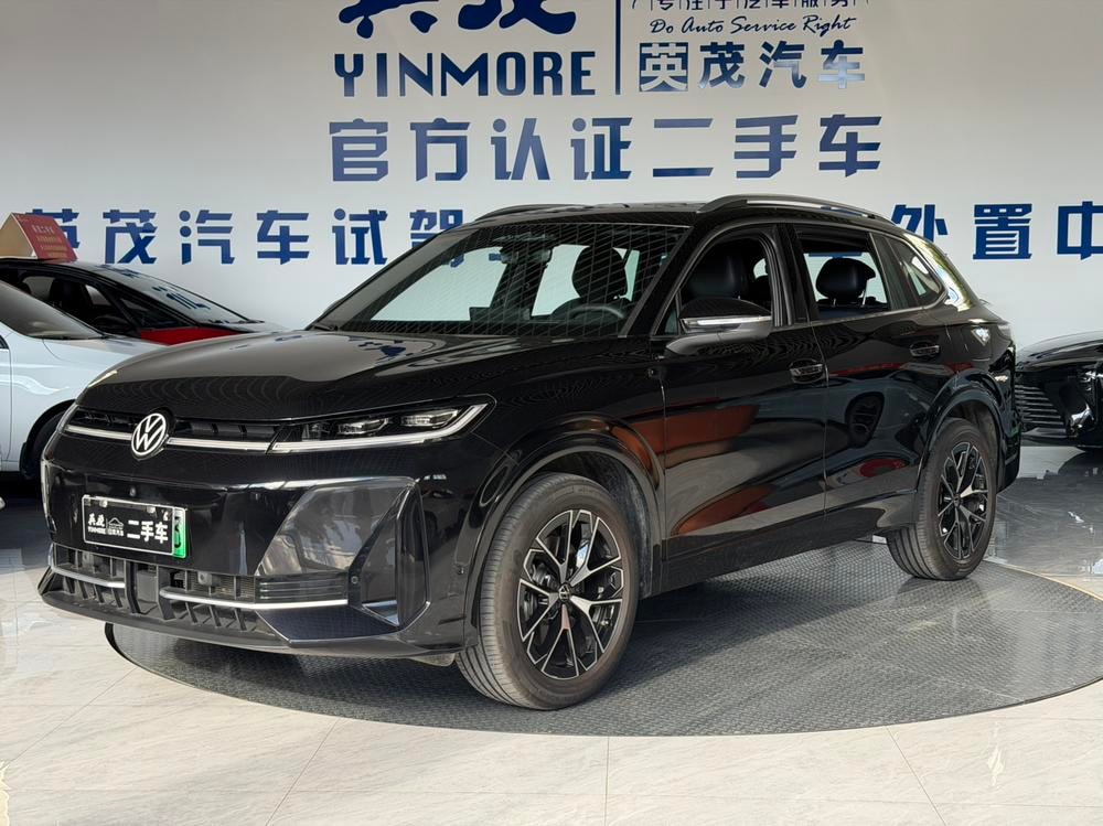 Volkswagen Tiguan L PHEV 2026 — фото автомобиля