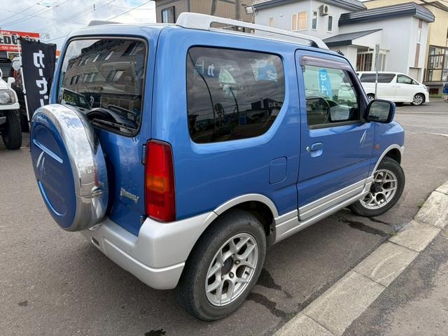 Suzuki JIMNY 2003 — фото автомобиля 1