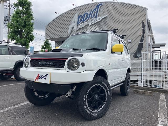 Suzuki JIMNY 2004 — фото автомобиля 1