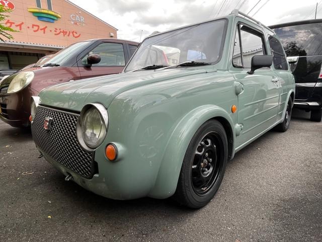 Nissan PAO 1990 — фото автомобиля 1