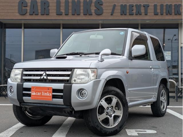 Mitsubishi PAJERO MINI 2012 — фото автомобиля 1