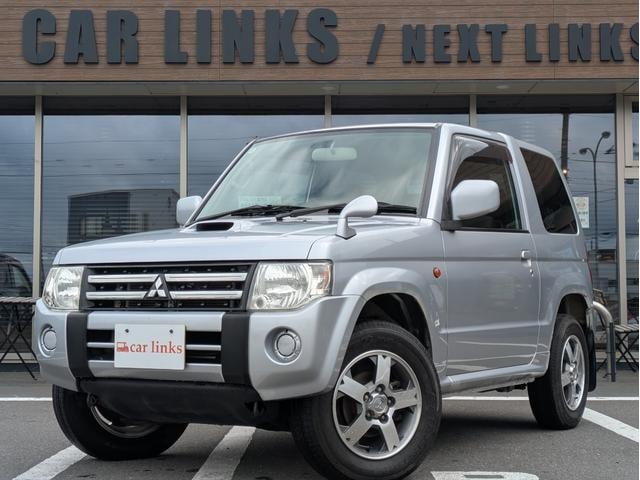 Mitsubishi PAJERO MINI 2010 — фото автомобиля 1