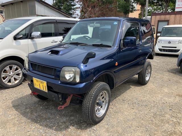 Suzuki JIMNY 2010 — фото автомобиля 1
