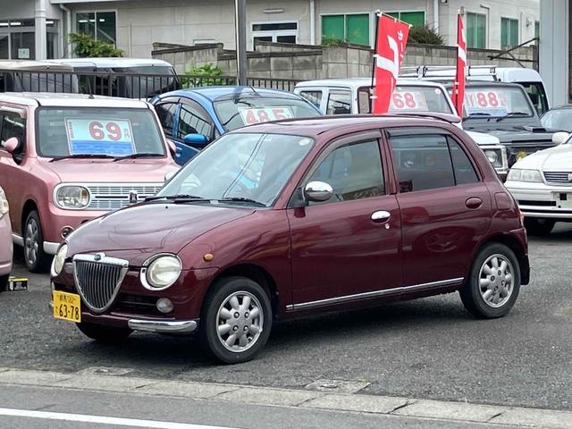 Daihatsu OPTI 1998 — фото автомобиля 1