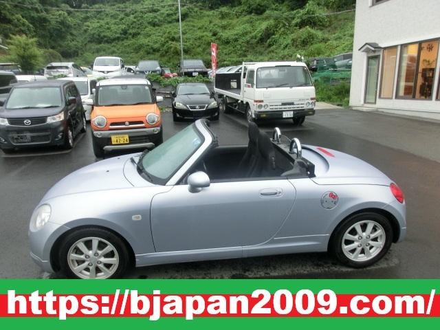 Daihatsu COPEN 2003 — фото автомобиля 1