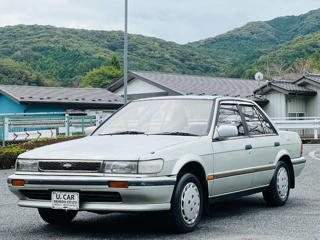 Nissan BLUEBIRD 1990 — фото автомобиля