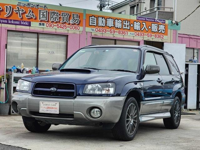 Subaru FORESTER 2004 — фото автомобиля 1