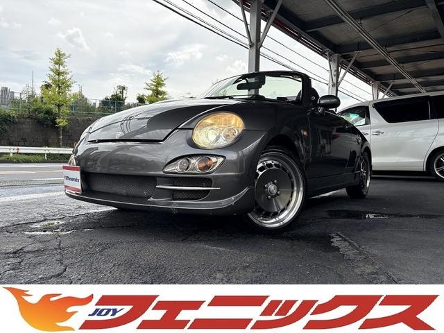 Daihatsu COPEN 2004 — фото автомобиля 1