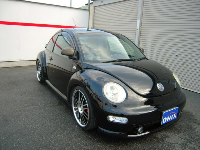 Volkswagen NEW BEETLE 2002 — фото автомобиля