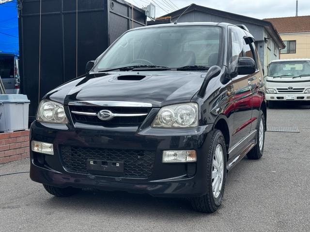 Daihatsu TERIOS KID 2009 — фото автомобиля 1