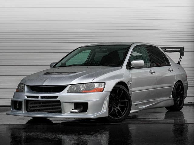 Mitsubishi LANCER 2003 — фото автомобиля 1