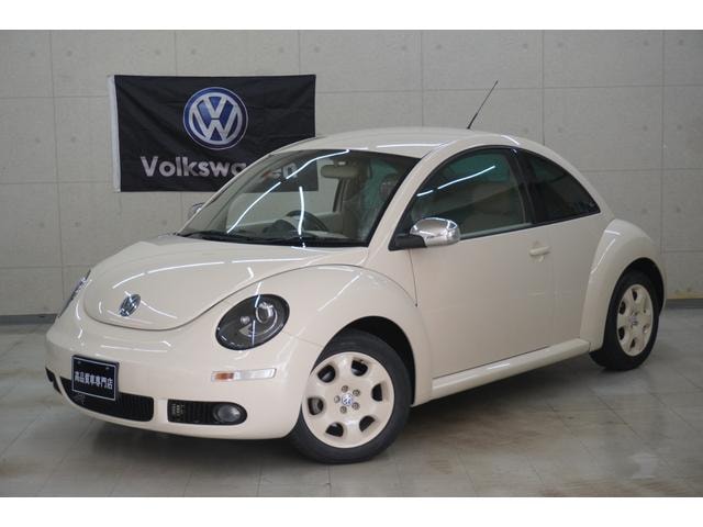 Volkswagen NEW BEETLE 2010 — фото автомобиля