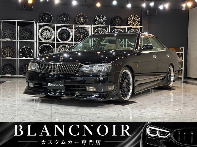 Nissan LAUREL 2002 — фото автомобиля