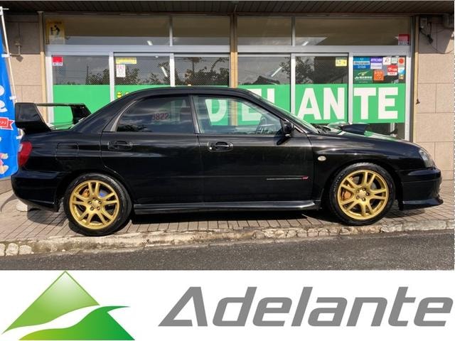 Subaru IMPREZA 2003 — фото автомобиля 1