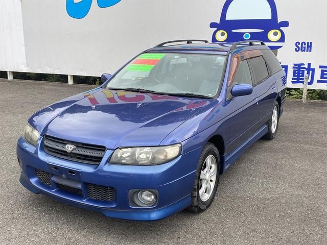 Nissan AVENIR 2000 — фото автомобиля 1