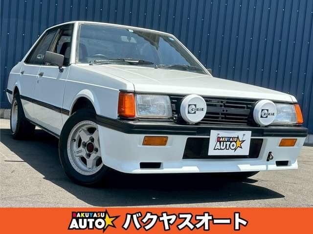 Mitsubishi LANCER EX 1987 — фото автомобиля 1