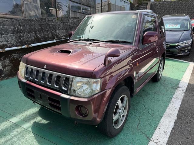 Mitsubishi PAJERO MINI 2010 — фото автомобиля 1