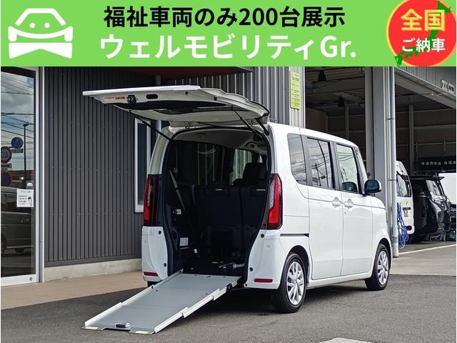 Honda N-BOX 2024 — фото автомобиля 1